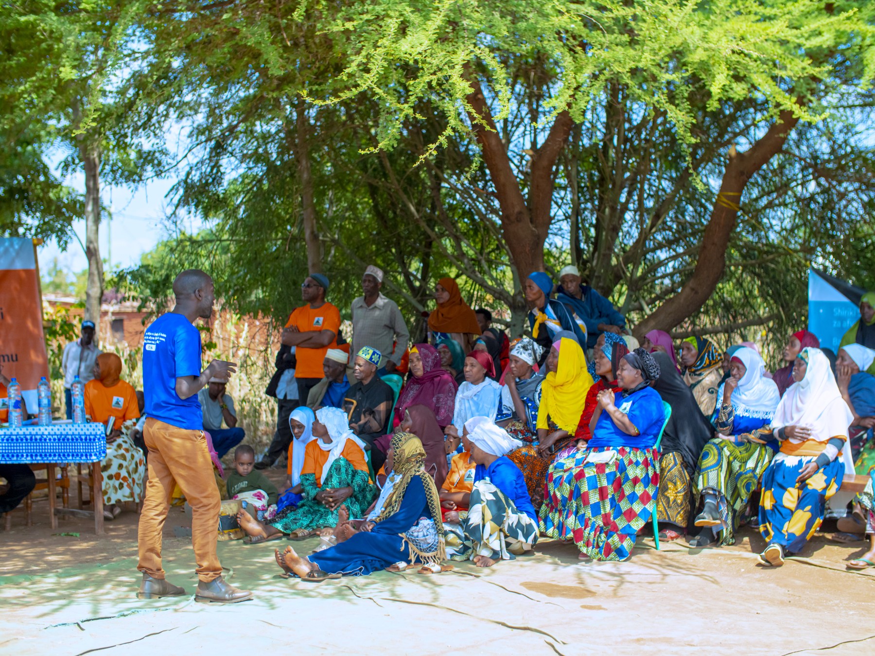 Community members participating in an outdoor learning session